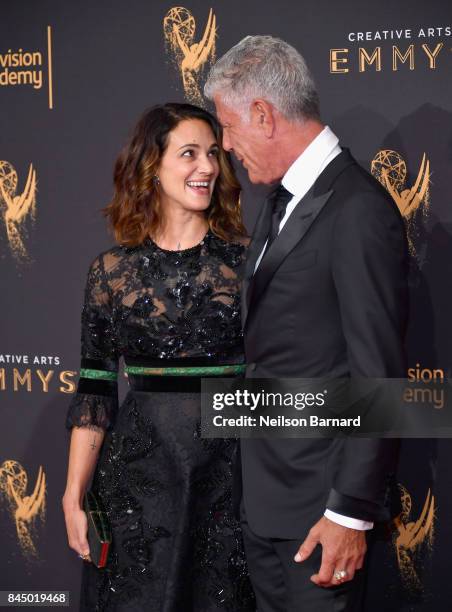 Actor Asia Argento and Anthony Bourdain attend day 1 of the 2017 Creative Arts Emmy Awards at Microsoft Theater on September 9, 2017 in Los Angeles,...