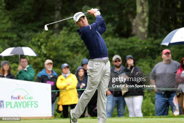 Justin Thomas, of the United States, hits from the 8th tee during the third round of the Dell Technologies Championship on September 3 at TPC Boston...