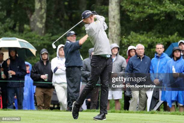 Mackenzie Hughes, of Canada, hits from the 8th tee during the third round of the Dell Technologies Championship on September 3 at TPC Boston in...
