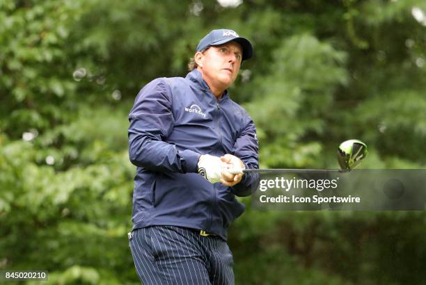 Phil Mickelson, of the United States, watches his drive on 9 during the third round of the Dell Technologies Championship on September 3 at TPC...