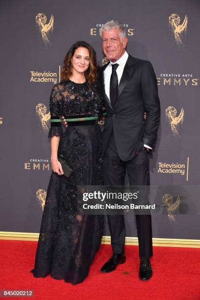 Actor Asia Argento and Anthony Bourdain attend day 1 of the 2017 Creative Arts Emmy Awards at Microsoft Theater on September 9, 2017 in Los Angeles,...