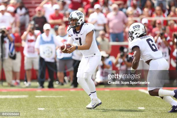 Horned Frog Kenny Hill hands the ball off in the game between the TCU horned Frogs and the Arkansas Razorbacks on September 9, 2017 at Donald W....