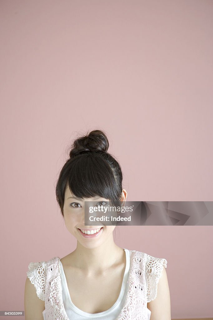 Japanese young woman smiling, portrait