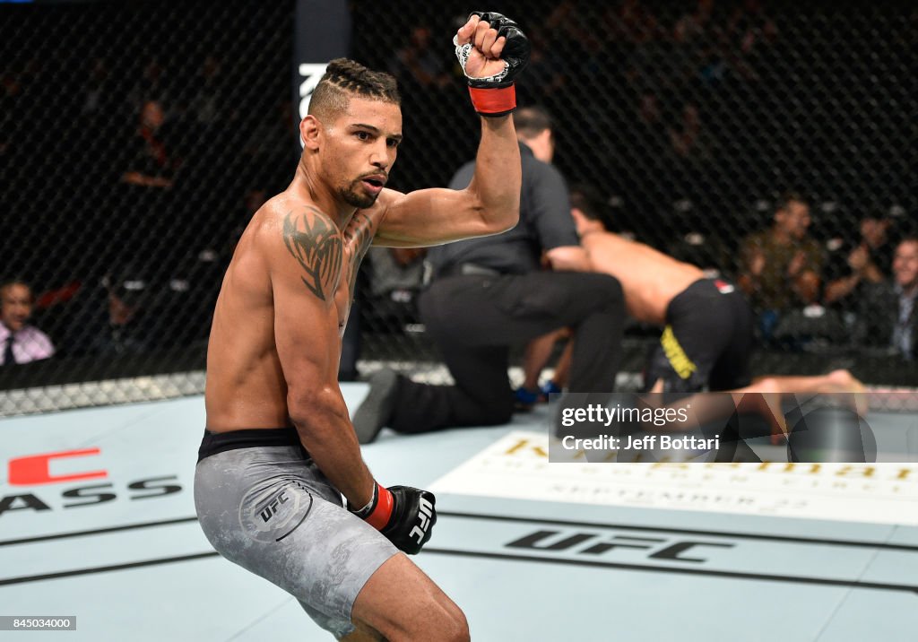 Kajan Johnson of Canada celebrates his knockout victory over Adriano ...