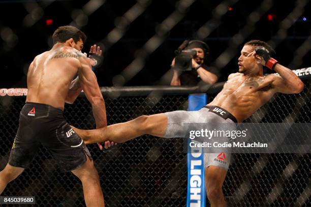 Kajan Johnson, right, fights Adriano Martins during UFC 215 at Rogers Place on September 9, 2017 in Edmonton, Canada.