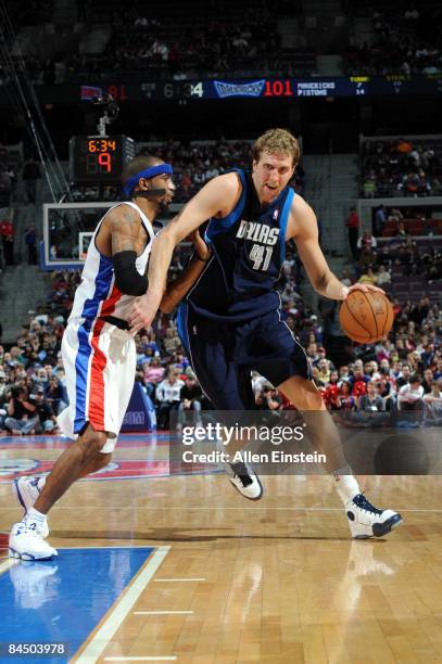 Dirk Nowitzki of the Dallas Mavericks drives to the basket against Richard Hamilton of the Detroit Pistons during the game at the Palace of Auburn...