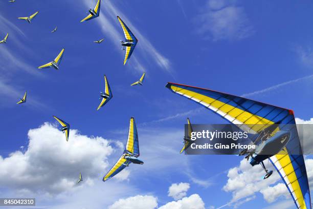 hang glider multi-layered effect, hungary. - deltaplane photos et images de collection