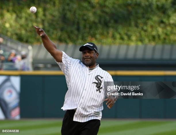 Hall of Fame Class of 2017 Inductee Tim Raines throws out a ceremonial first pitch before the game between the Chicago White Sox and the San...