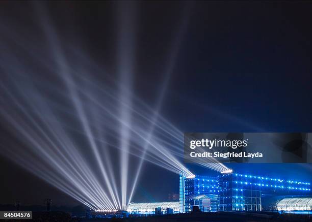 lightbeams on night sky - building opening ceremony stock pictures, royalty-free photos & images