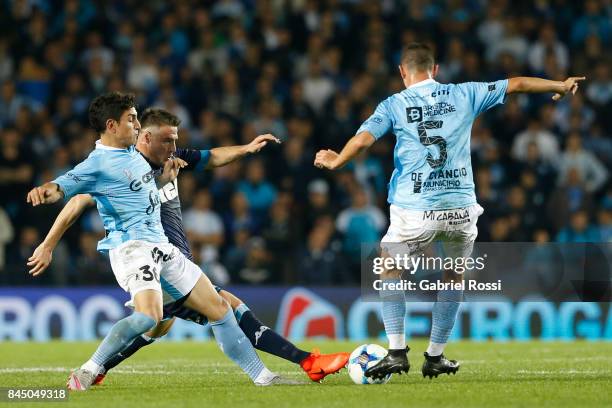 Ivan Pillud of Racing Club fights for the ball with Gonzalo Escobar of Temperley during a match between Racing Club and Temperley as part of the...