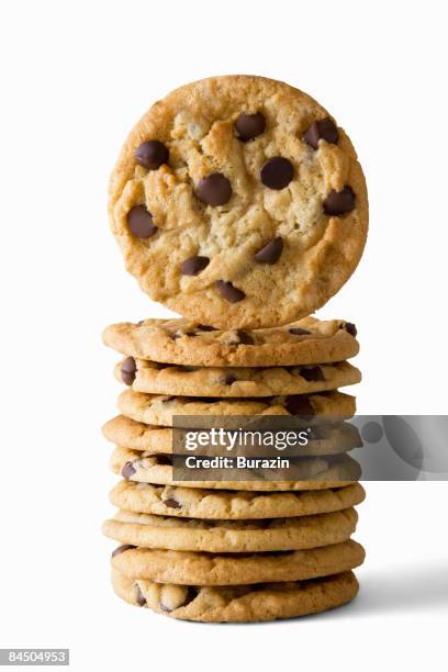 stack of chocolate chip cookies - chocolate chip cookie on white stock pictures, royalty-free photos & images