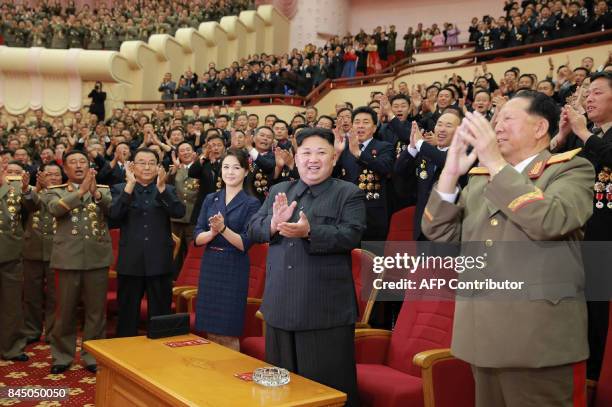 This undated picture released by North Korea's official Korean Central News Agency on September 10, 2017 shows North Korean leader Kim Jong-Un and...