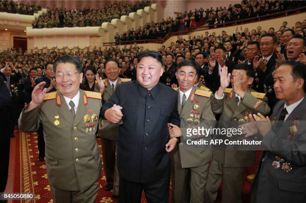 This undated picture released by North Korea's official Korean Central News Agency on September 10, 2017 shows North Korean leader Kim Jong-Un...