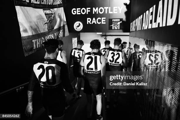 Chad Wingard and Jared Polec of the Power walk from the field after the AFL First Elimination Final match between Port Adelaide Power and West Coast...