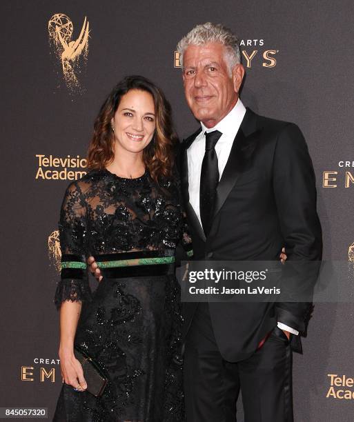 Asia Argento and Anthony Bourdain attend the 2017 Creative Arts Emmy Awards at Microsoft Theater on September 9, 2017 in Los Angeles, California.