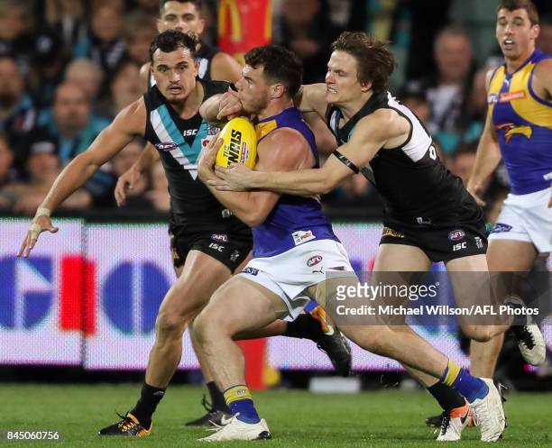 Luke Shuey of the Eagles is tackled by Jared Polec of the Power illegally before kicking the winning goal during the AFL First Elimination Final...