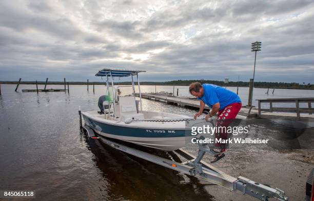 Chris Crosby pulls his boat from Spring Creek in the north Florida panhandle south of Tallahassee September 9, 2017 in Crawfordville, Florida....