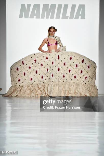 Model walks the runway at the Namilia fashion show during New York Fashion Week: The Shows at Gallery 3, Skylight Clarkson Sq on September 9, 2017 in...