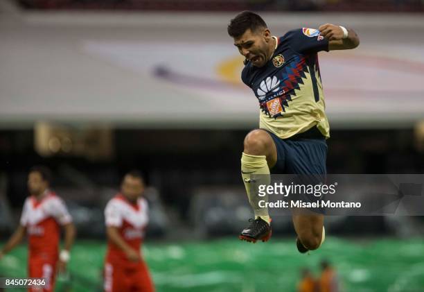 Silvio Romero of America celebrates after scoring the first goal of his team during the 8th round match between America and Veracruz as part of the...