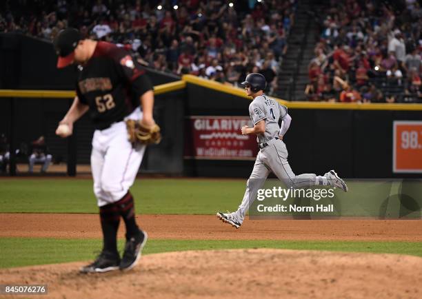 Wil Myers of the San Diego Padres rounds the bases after hitting a two run home run off of Zack Godley of the Arizona Diamondbacks during the seventh...