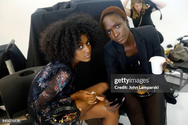 Models prepare backstage during the Christian Siriano collection during the September 2017 New York Fashion Week: The Shows at Pier 59 on September...