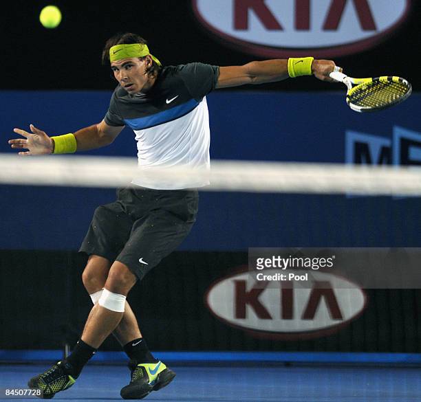 Rafael Nadal of Spain plays a backhand slice in his quarter final match against Gilles Simon of France during day ten of the 2009 Australian Open at...