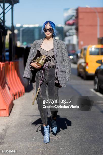 Irene Kim seen in the streets of Manhattan outside Self-Portrait during New York Fashion Week on September 9, 2017 in New York City.