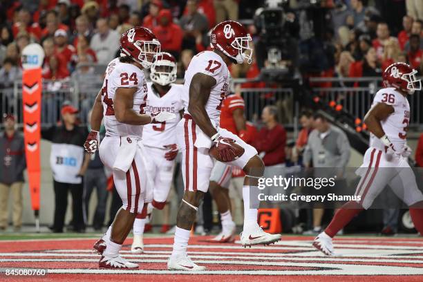 Jordan Smallwood of the Oklahoma Sooners celebrates scoring a touchdown during the fourth quarter against the Ohio State Buckeyes at Ohio Stadium on...