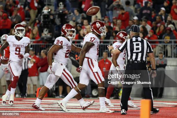 Jordan Smallwood of the Oklahoma Sooners celebrates scoring a touchdown during the fourth quarter against the Ohio State Buckeyes at Ohio Stadium on...