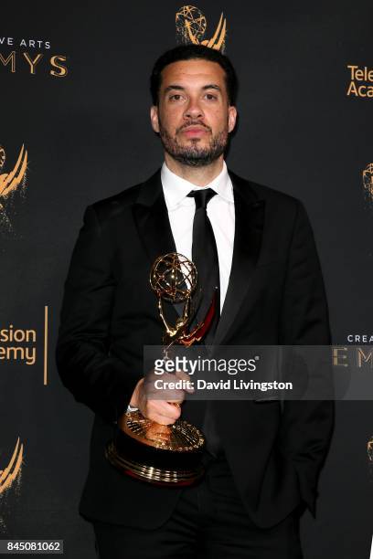Producer Ezra Edelman poses in the press room with the award for outstanding directing for a nonfiction program for "O.J.: Made in America" during...