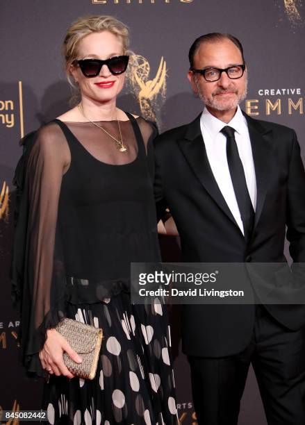 Producer Alexis Bloom and actor Fisher Stevens attend the 2017 Creative Arts Emmy Awards at Microsoft Theater on September 9, 2017 in Los Angeles,...