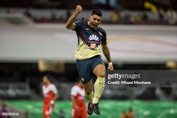 Silvio Romero of America celebrates after scores during the eighth round match between America and Veracruz as part of the Torneo Apertura 2017 Liga...