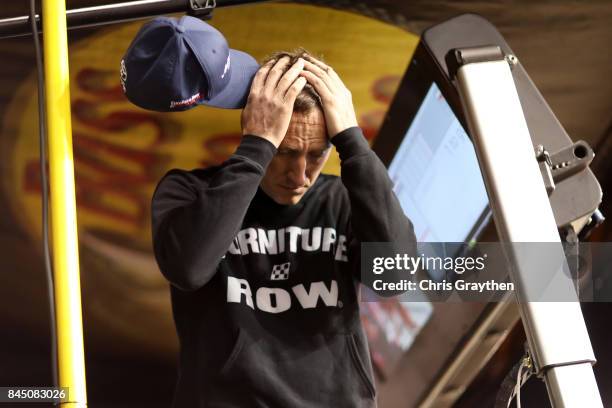 Crew chief Cole Pearn of the Martin Truex Jr., driver of the Auto-Owners Insurance Toyota, reacts after the end of the race for the Monster Energy...