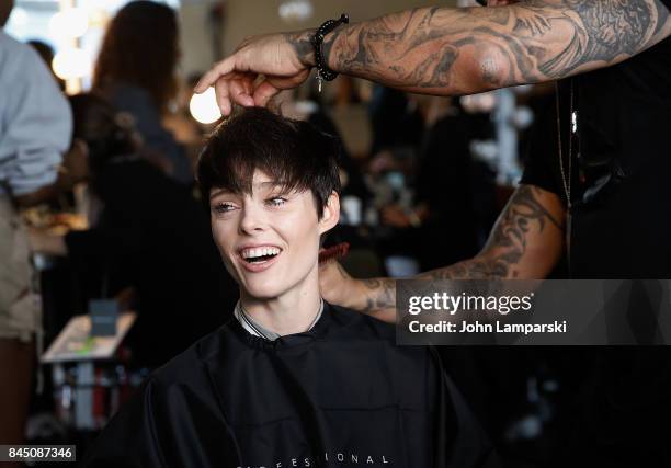 Coco Rocha prepares backstage during the Christian Siriano collection during the September 2017 New York Fashion Week: The Shows at Pier 59 on...