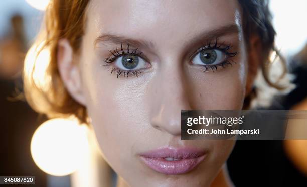Models prepare backstage during the Christian Siriano collection during the September 2017 New York Fashion Week: The Shows at Pier 59 on September...