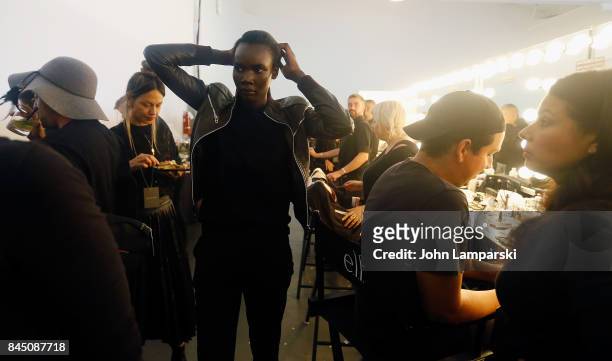 Models prepare backstage during the Christian Siriano collection during the September 2017 New York Fashion Week: The Shows at Pier 59 on September...