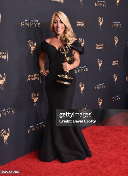 Lori Grenier poses in the press room with the award for outstanding structured reality program for" Shark Tank" at the 2017 Creative Arts Emmy Awards...