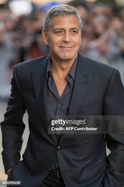 George Clooney poses for photographers at premiere of "Suburbicon" at the Toronto International Film Festival in Toronto, Ontario, September 9,...