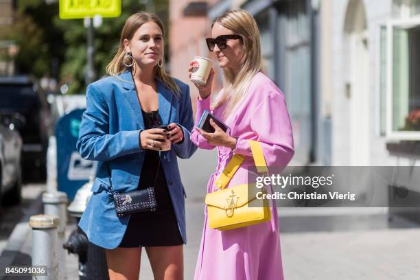 Sabrina Meijer and Charlotte Groeneveld drinking coffee seen in the streets of Manhattan outside Tibi during New York Fashion Week on September 9,...