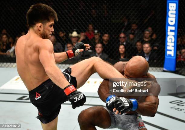 Henry Cejudo kicks Wilson Reis of Brazil in their flyweight bout during the UFC 215 event inside the Rogers Place on September 9, 2017 in Edmonton,...