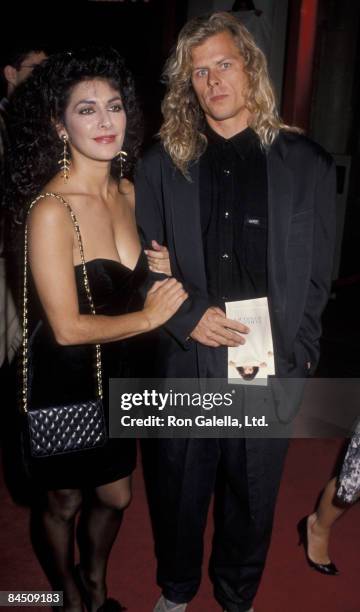 Actress Marina Sirtis and husband Michael Lamper attending the premiere of "Sibling Rivalry" on October 24, 1990 at Mann Chinese Theater in...