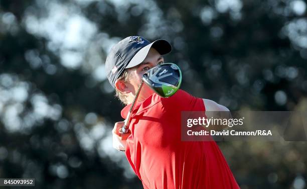 Maverick McNealy of the United States team plays his tee shot on the 17th hole in his match against Scott Gregory of the Great Britain and Ireland...