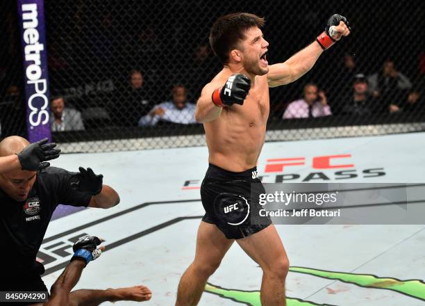 Henry Cejudo celebrates his knockout victory over Wilson Reis of Brazil in their flyweight bout during the UFC 215 event inside the Rogers Place on...