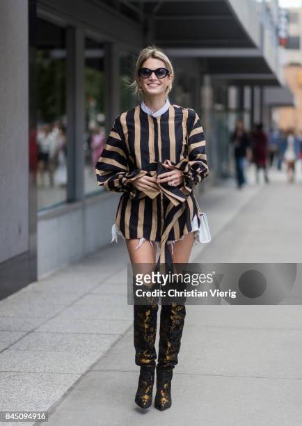 Helena Bordon wearing striped top, overknee boots seen in the streets of Manhattan outside Dion Lee during New York Fashion Week on September 9, 2017...
