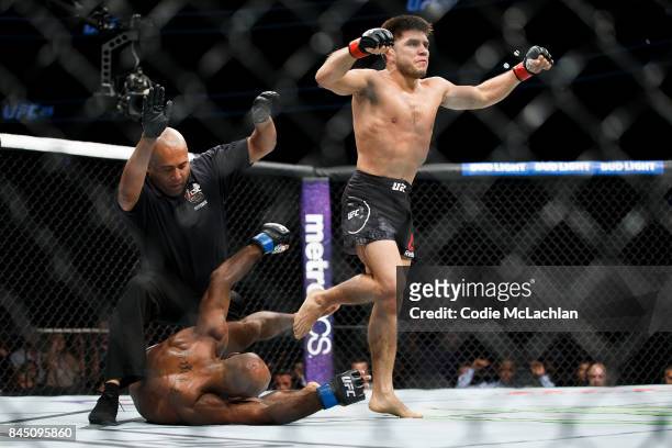 Henry Cejudo, top, reacts after defeating Wilson Reis during UFC 215 at Rogers Place on September 9, 2017 in Edmonton, Canada.