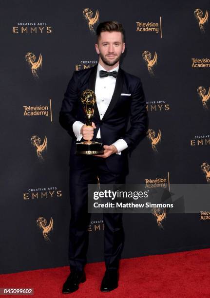 Dancer Travis Wall poses in the pressroom during the 2017 Creative Arts Emmy Awards at Microsoft Theater on September 9, 2017 in Los Angeles,...