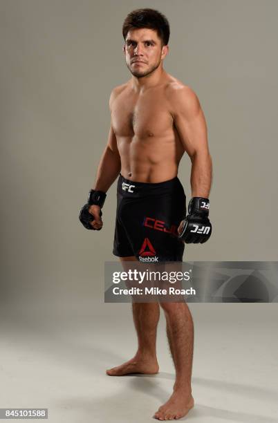 Henry Cejudo poses for a post fight portrait backstage during the UFC 215 event inside the Rogers Place on September 9, 2017 in Edmonton, Alberta,...