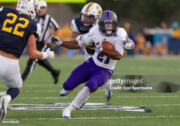 Central Arkansas running back Kierre Crossley is tackled by Murray State defensive back Zachary Wade during the college football game between the...
