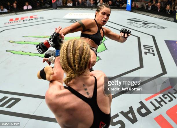 Amanda Nunes of Brazil kicks Valentina Shevchenko of Kyrgyzstan in their women's bantamweight bout during the UFC 215 event inside the Rogers Place...