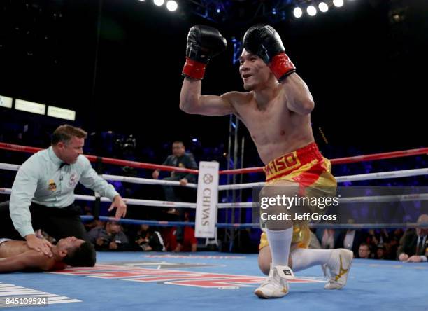 Srisaket Sor Rungvisai of Thailand celebrates as Roman Gonzalez of Nicaragua is counted out at StubHub Center on September 9, 2017 in Carson,...